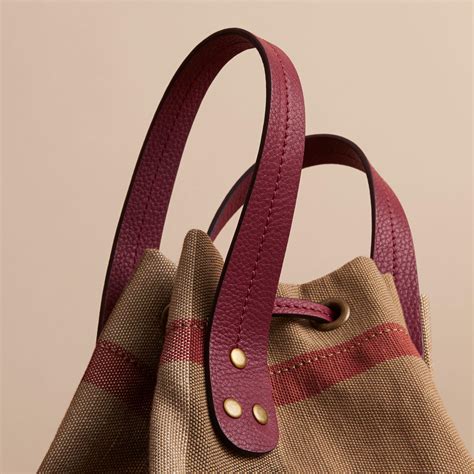 long burberry purse burgandy handheld bucket|burberry bucket bag.